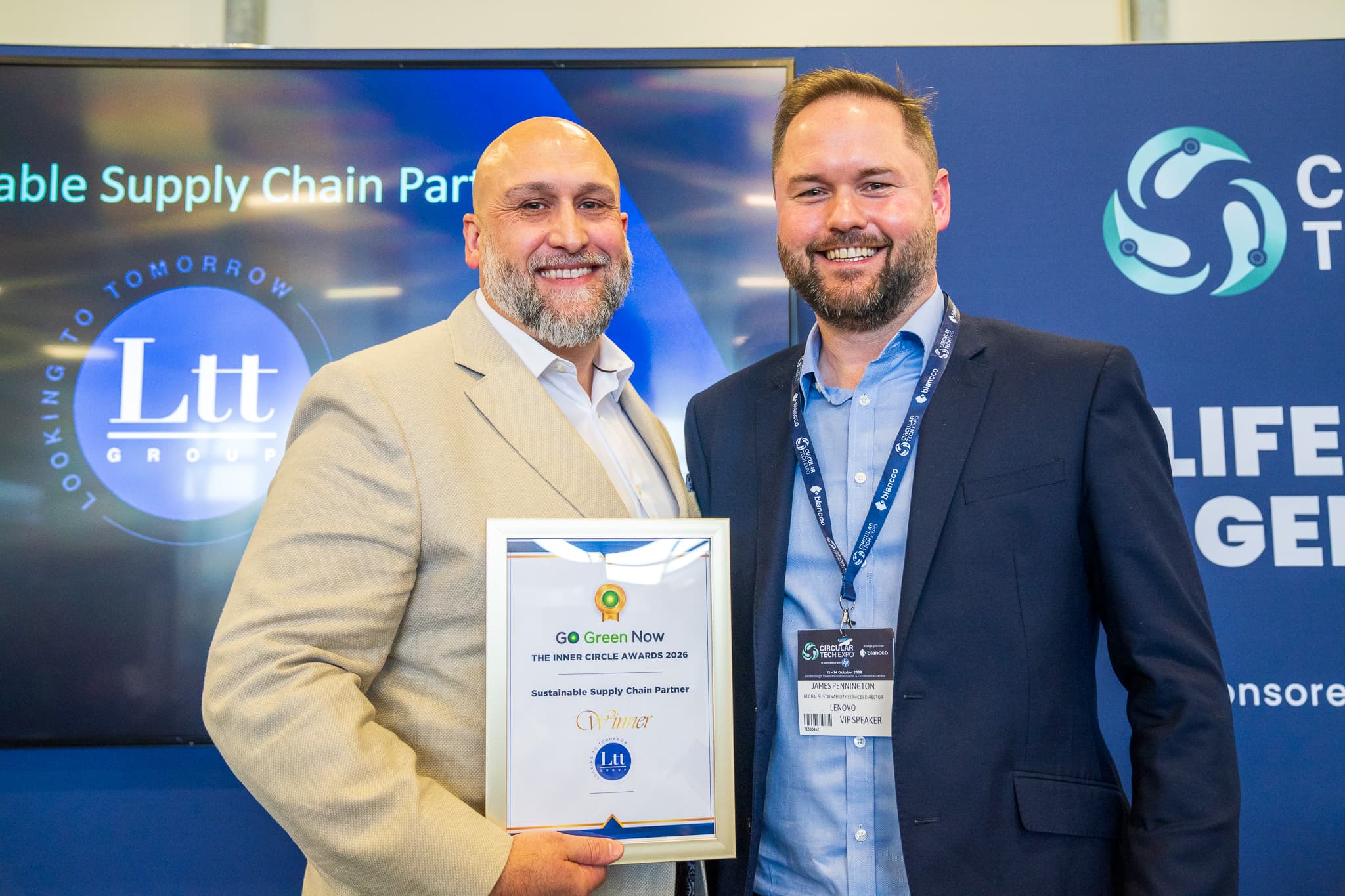 Jon Wragg of Ltt Group holding the Sustainable Supply Chain Partner winner's certificate, standing with James Pennington of Lenovo at the Go Green Now Inner Circle Awards 2026